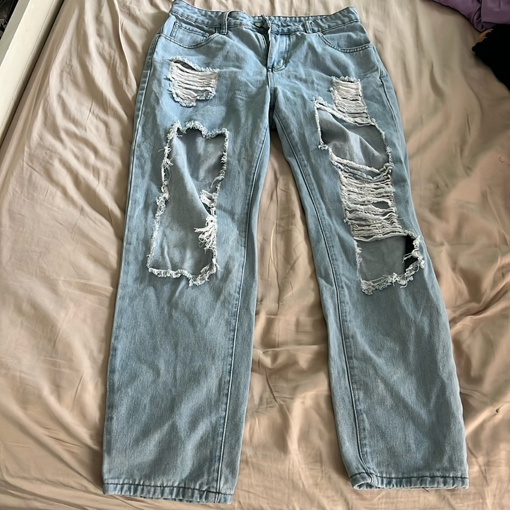 Very Distressed Light Wash Skinny Blue Jeans